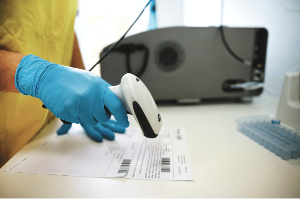 A caregiver utilizes barcode scanning for medications.