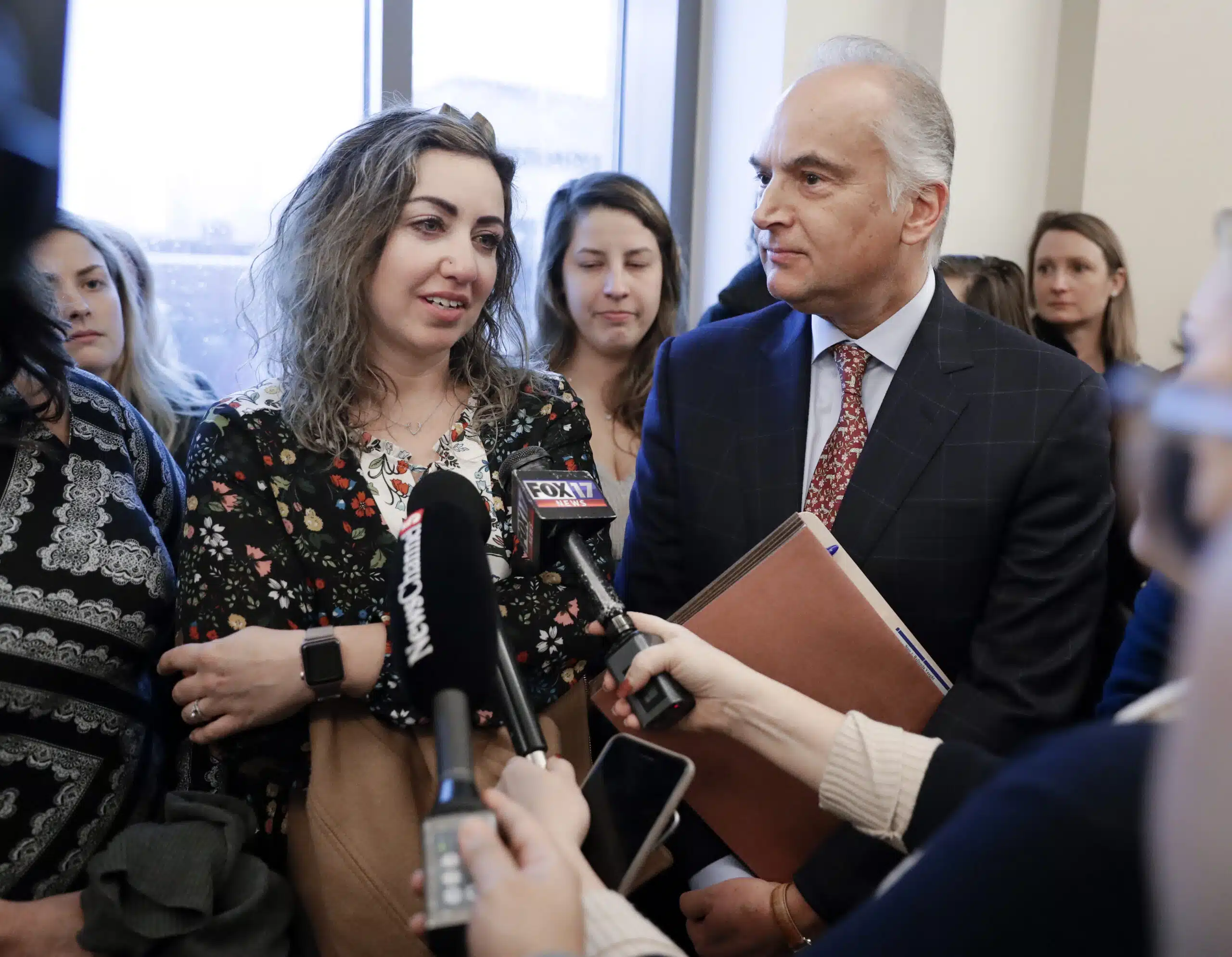 RaDonda Vaught answers questions with her attorney Peter Strianse after a court hearing February 20, 2019.