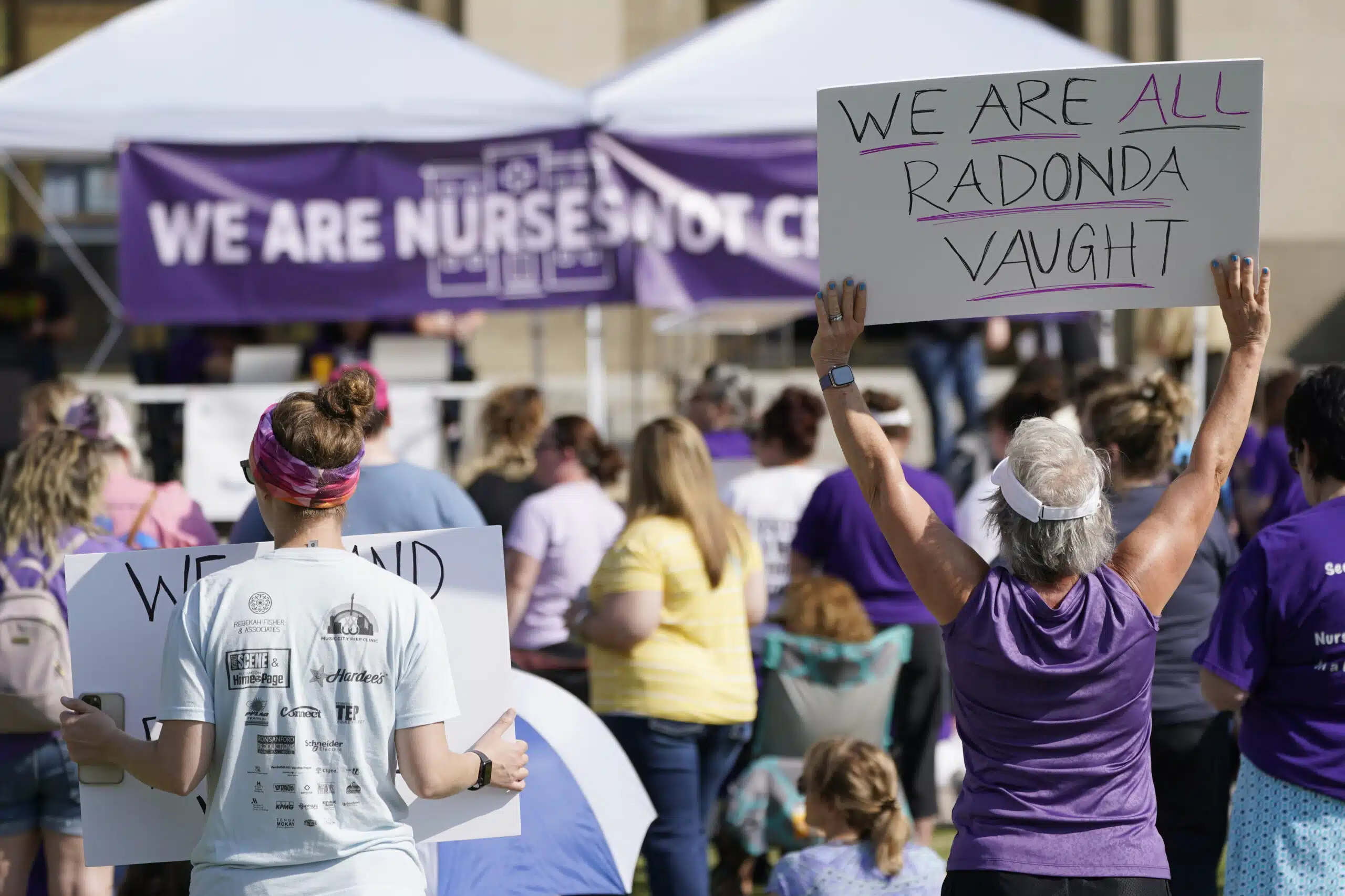 Demonstrators gather outside the courthouse where the sentencing hearing for former nurse RaDonda Vaught is being held Friday, May 13, 2022, in Nashville, Tenn. Vaught was found guilty of criminally negligent homicide in the death of a patient in March after she accidentally administered the wrong medication.