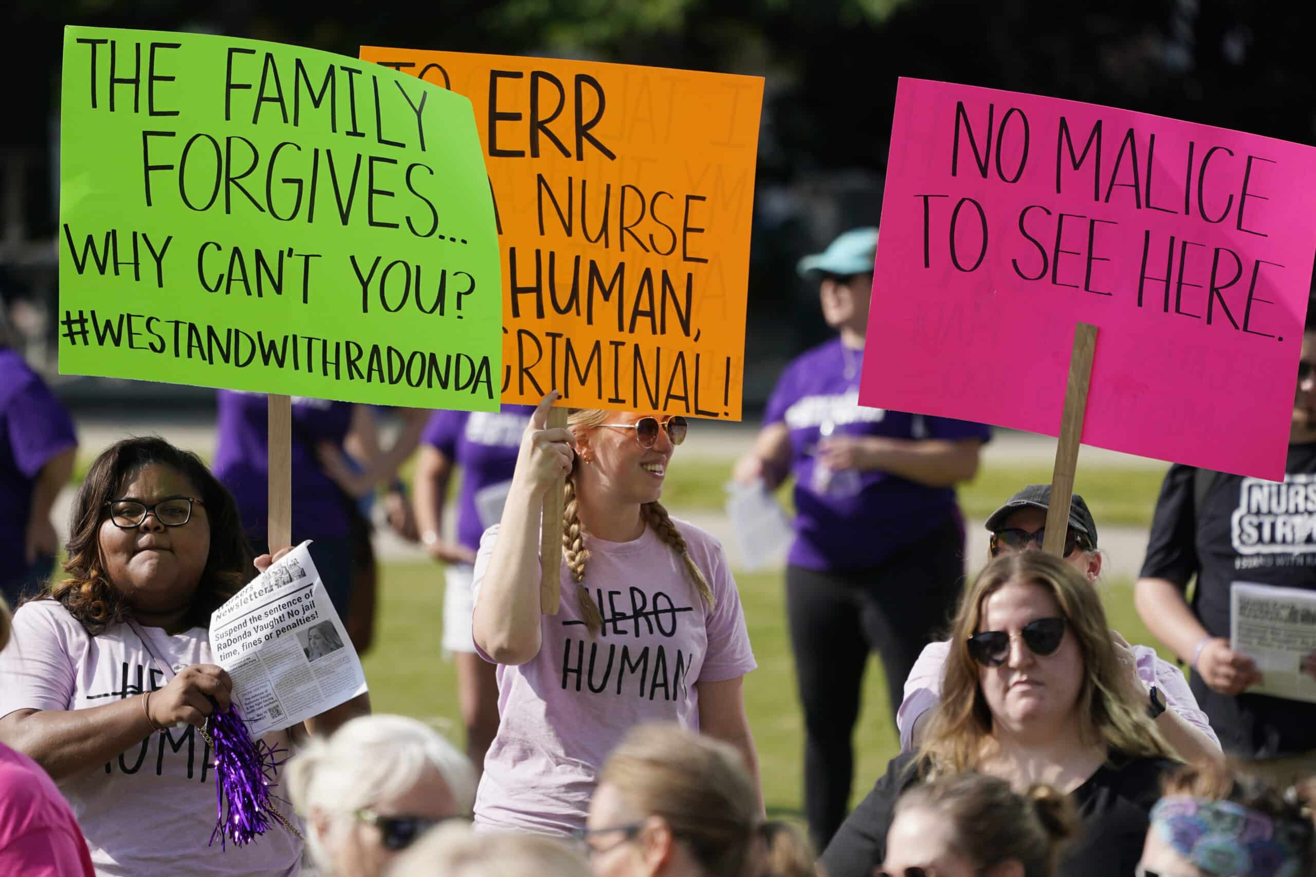 Demonstrators gather outside the courthouse where the sentencing hearing for Vaught is being held Friday, May 13, 2022, in Nashville.