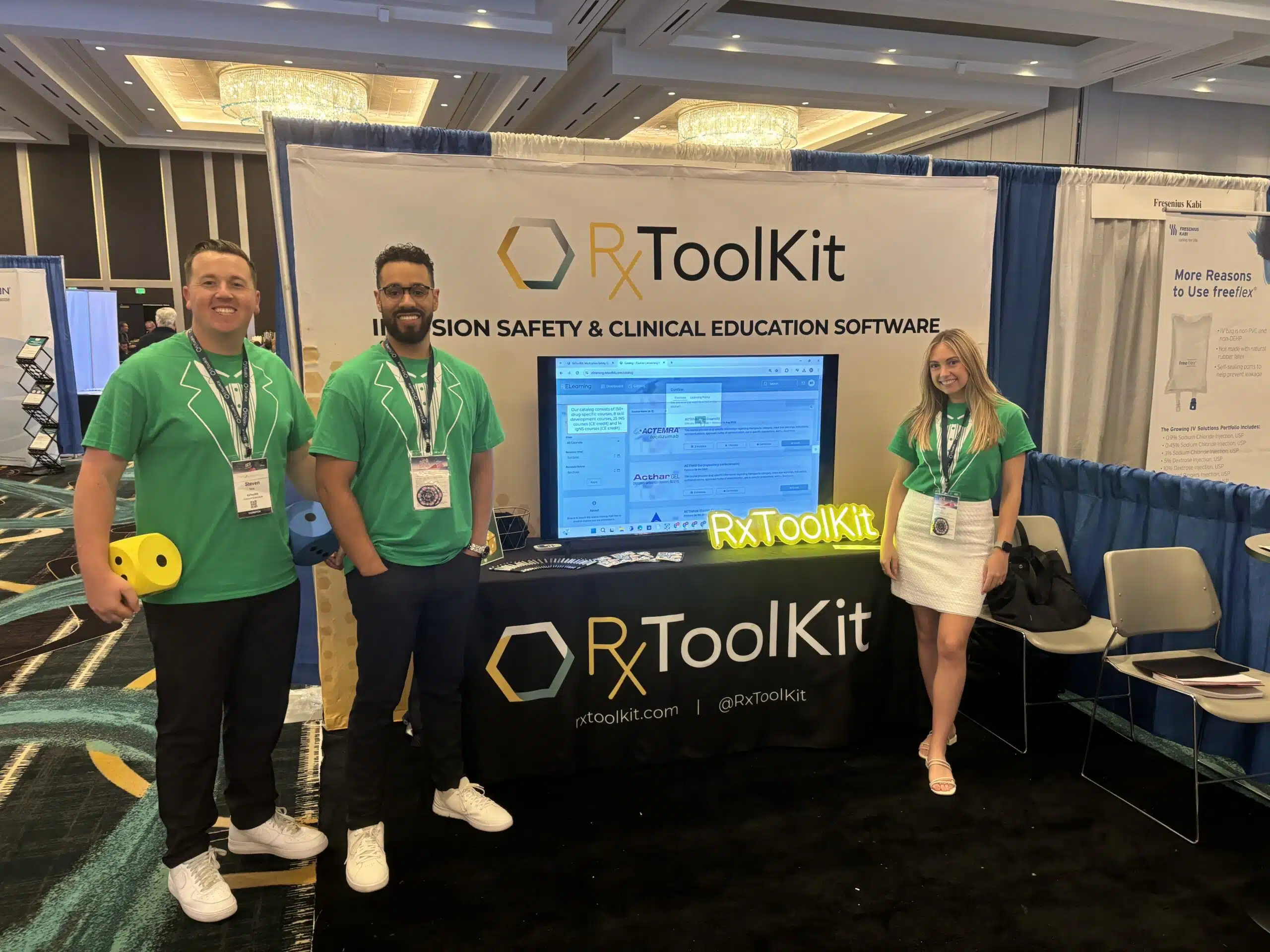 The RxToolKit Team taking a group picture in the 2024 NICA Conference Exhibit Hall.