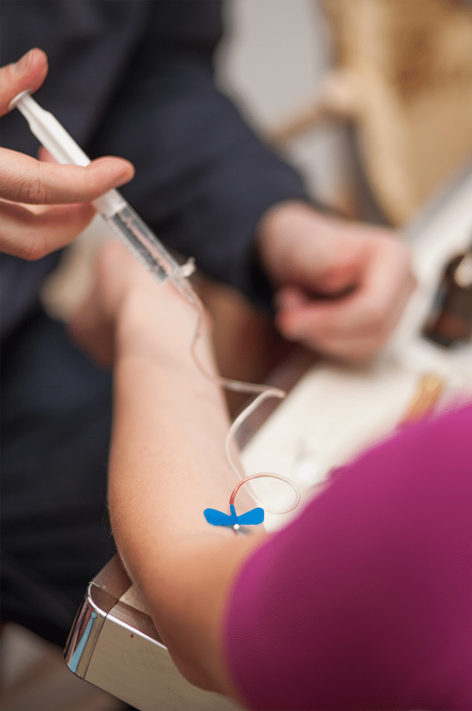 Patient receiving an IV Push.