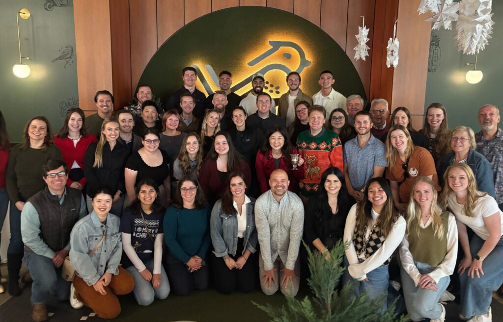 The RxToolKit & WeInfuse team pose for a team picture at their annual holiday party in 2024.