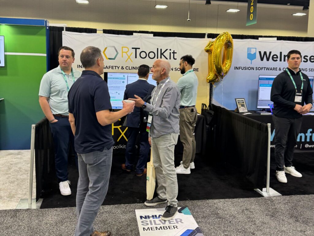 The RxToolKit booth with attendees at the 2026 NHIA Conference.