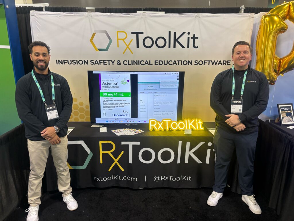 RxToolKit Account Executives in front of the RxToolKit booth at the conference.