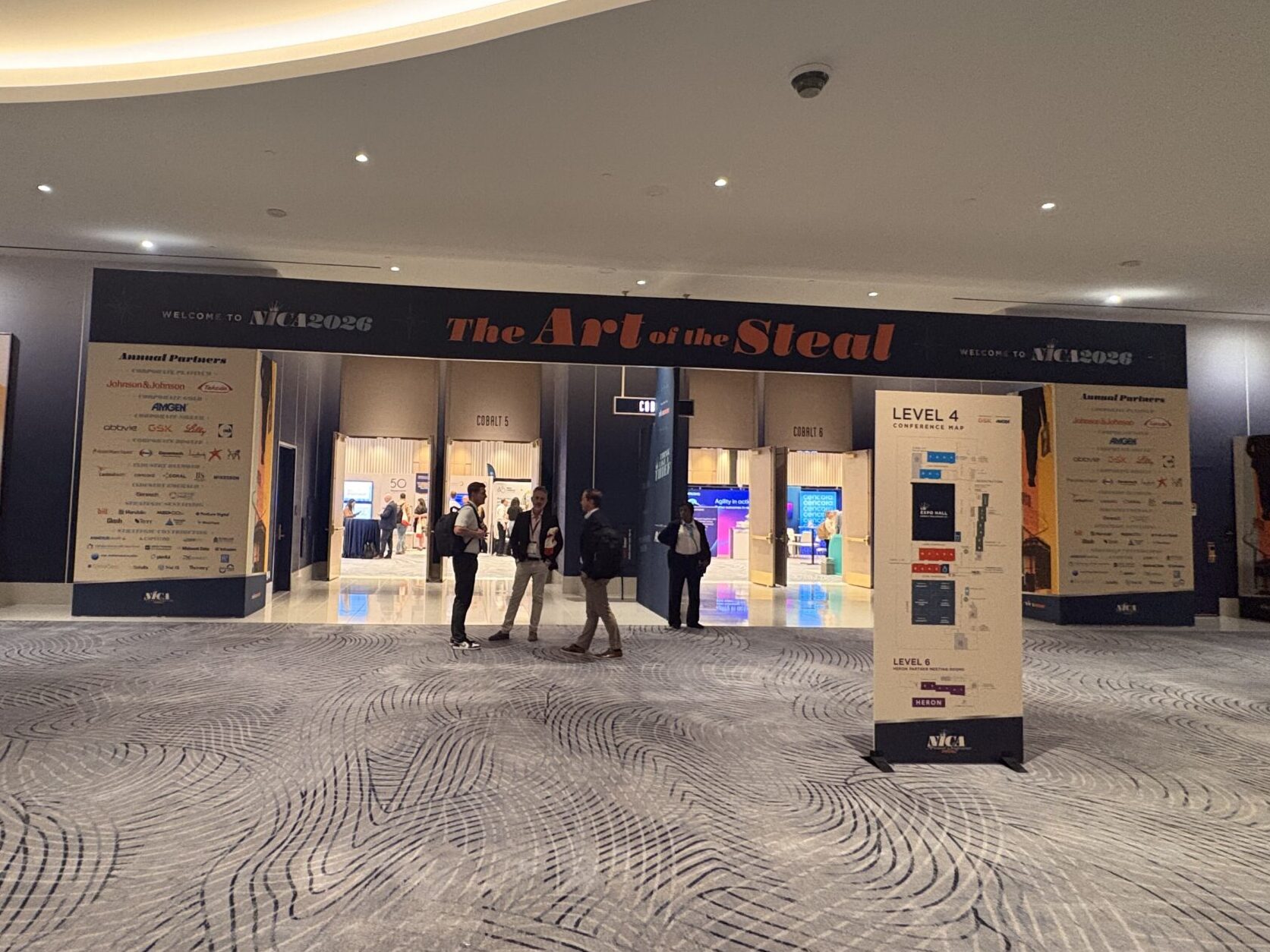 The entrance to the exhibit hall at the 2026 NICA Conference, with "The Art of the Steal" written across it.
