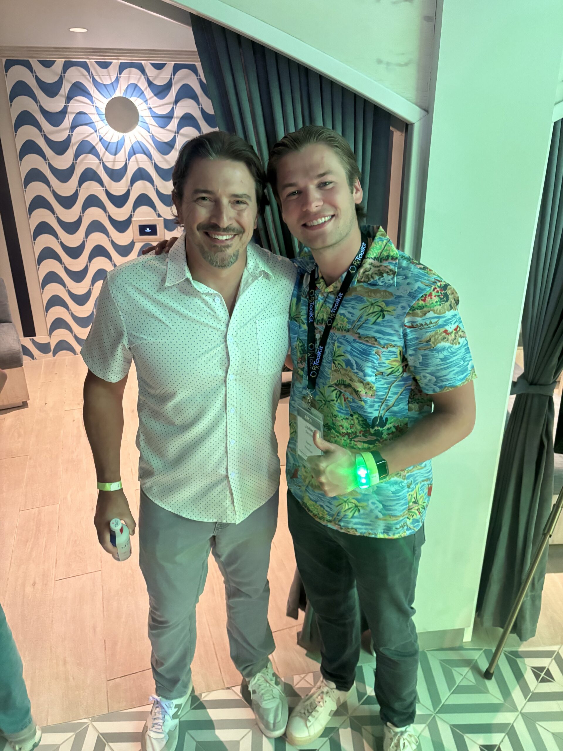 RxToolKit CEO Bryan Johnson and Tennr's John Santillo pose for a picture at the Tennr Welcome to the Jungle party.